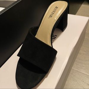 Black heeled mules